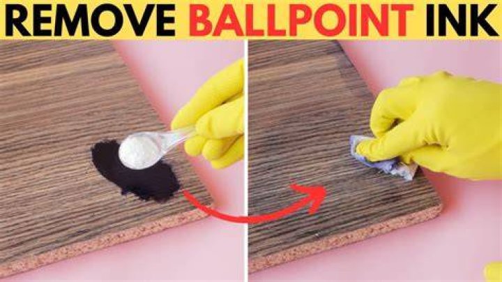 How do you remove ink from a wooden table